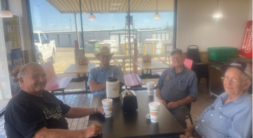 Image if men enjoying the c-store experience at Garrison Food Mart Memphis TX