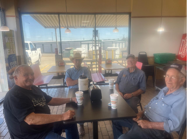 Image if men enjoying the c-store experience at Garrison Food Mart Memphis TX