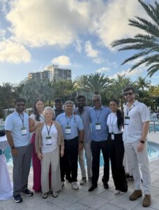 Convenience store leaders networking and discussing convenience store operations best practices at an industry conference.