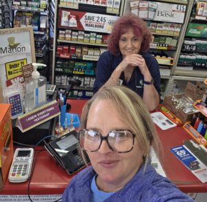 Laura working with her Tang Mart store team