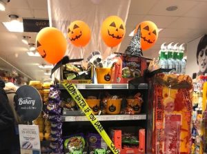 Halloween promotions for convenience stores featuring seasonal candy and products
